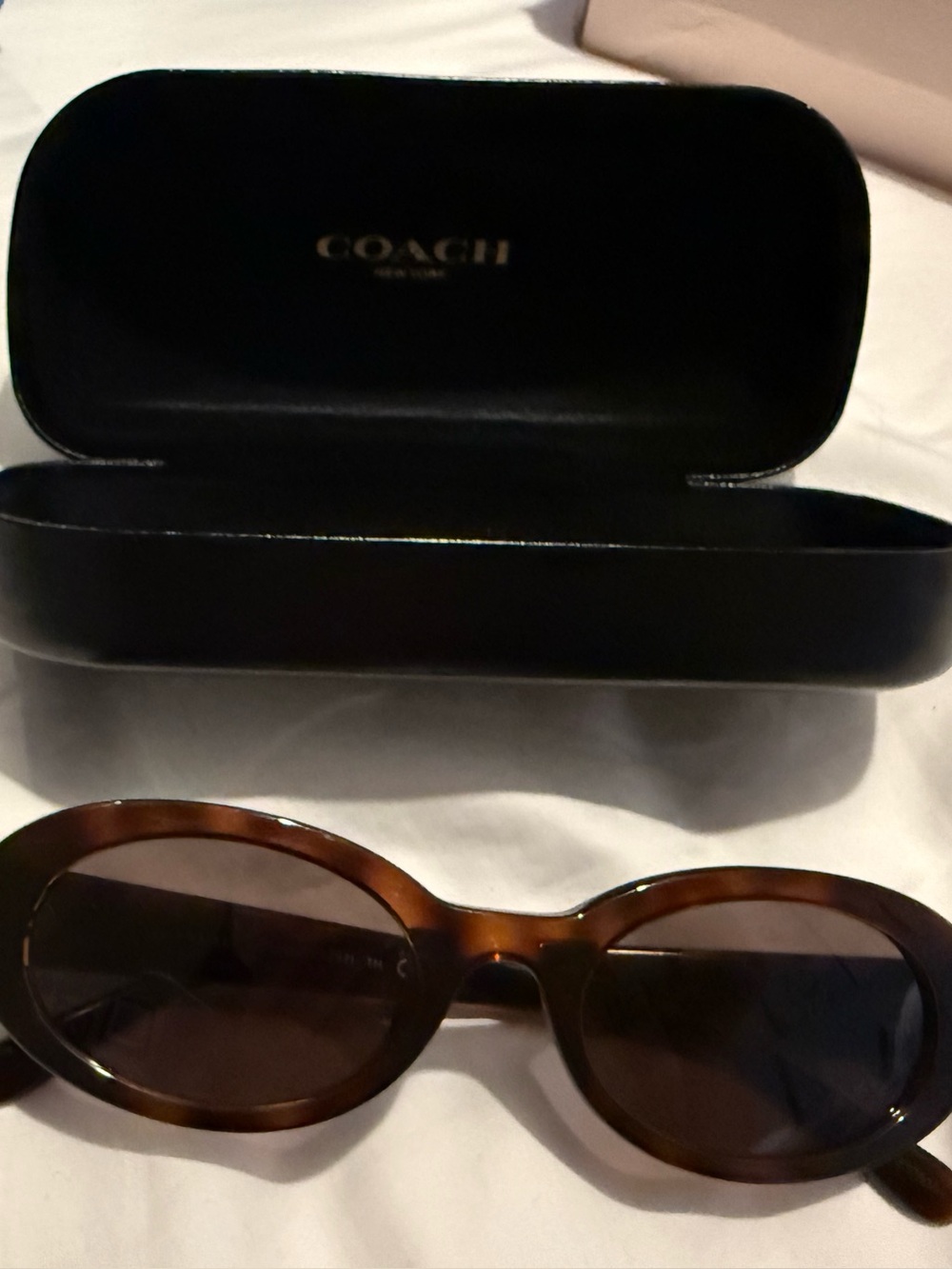 COACH Tortoise Oval Women's Sunglasses with Dark Lenses